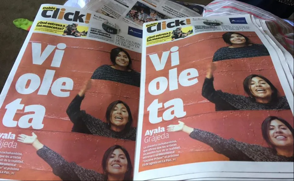 Copies of the newspaper supplement Click! with Violeta Ayala Grajeda on the cover.